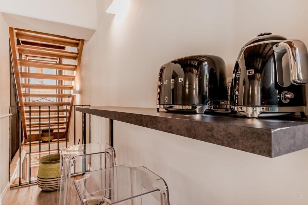 a kitchen with two toasters on a counter at APT ROME - Vittoria Palace in Rome