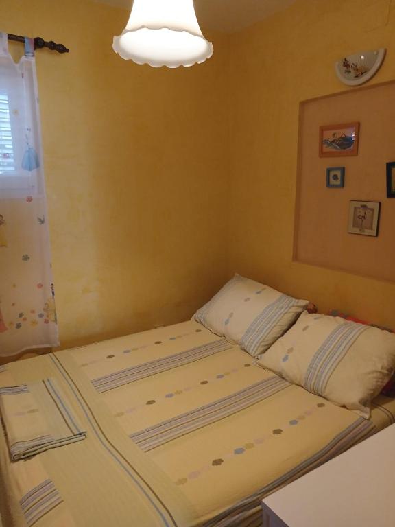 Posteľ alebo postele v izbe v ubytovaní Apartment Seget Vranjica 1051b