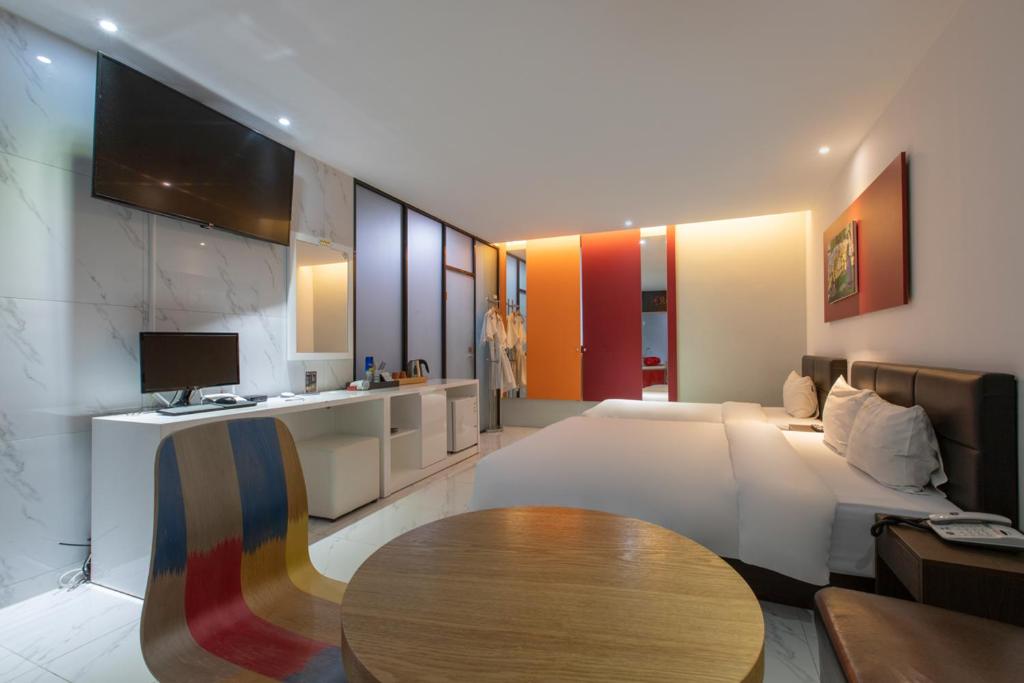 Postel nebo postele na pokoji v ubytování Incheon Pentastar Hotel