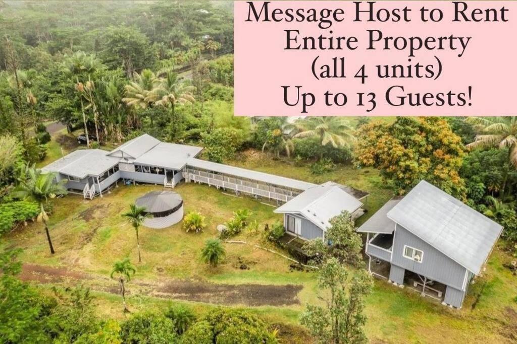 an aerial view of a house in a forest at Monstera Bungalow, Spacious, King Bed, Big Kitchen in Keaau
