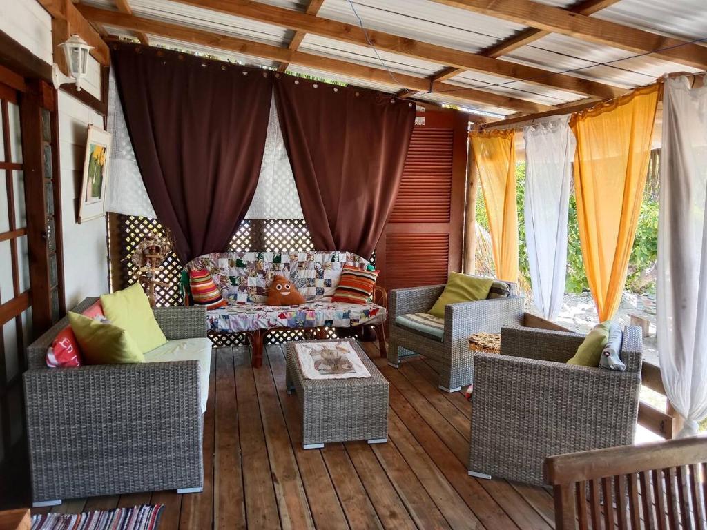 Posezení v ubytování Chalet chez Téra'i