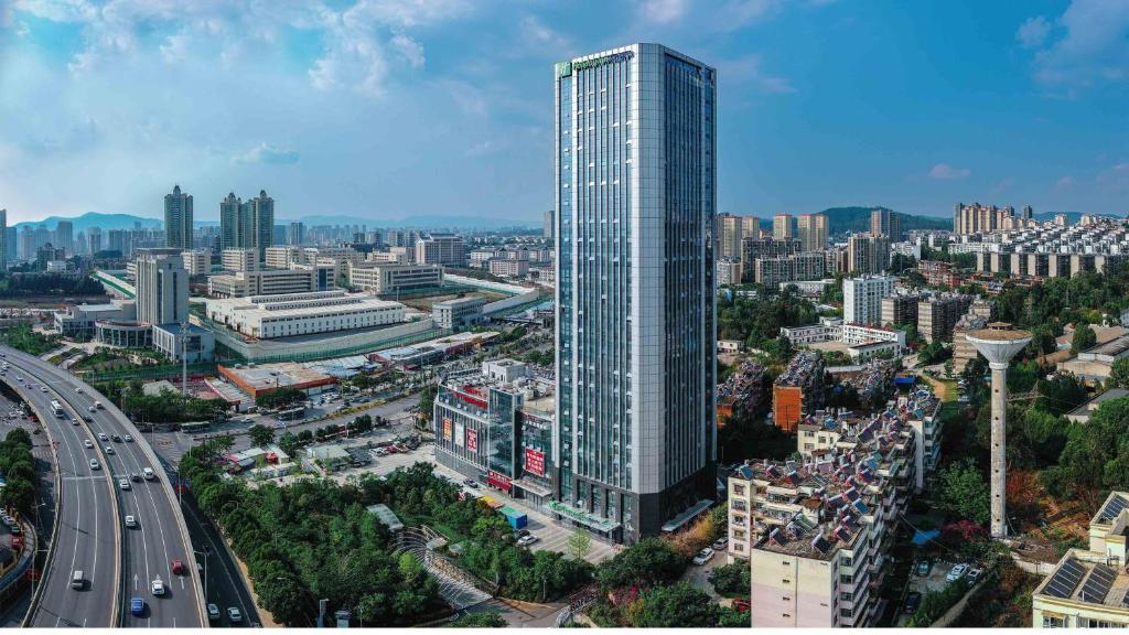 an overhead view of a city with a tall building at Holiday Inn Express Kunming Panlong, an IHG Hotel in Kunming