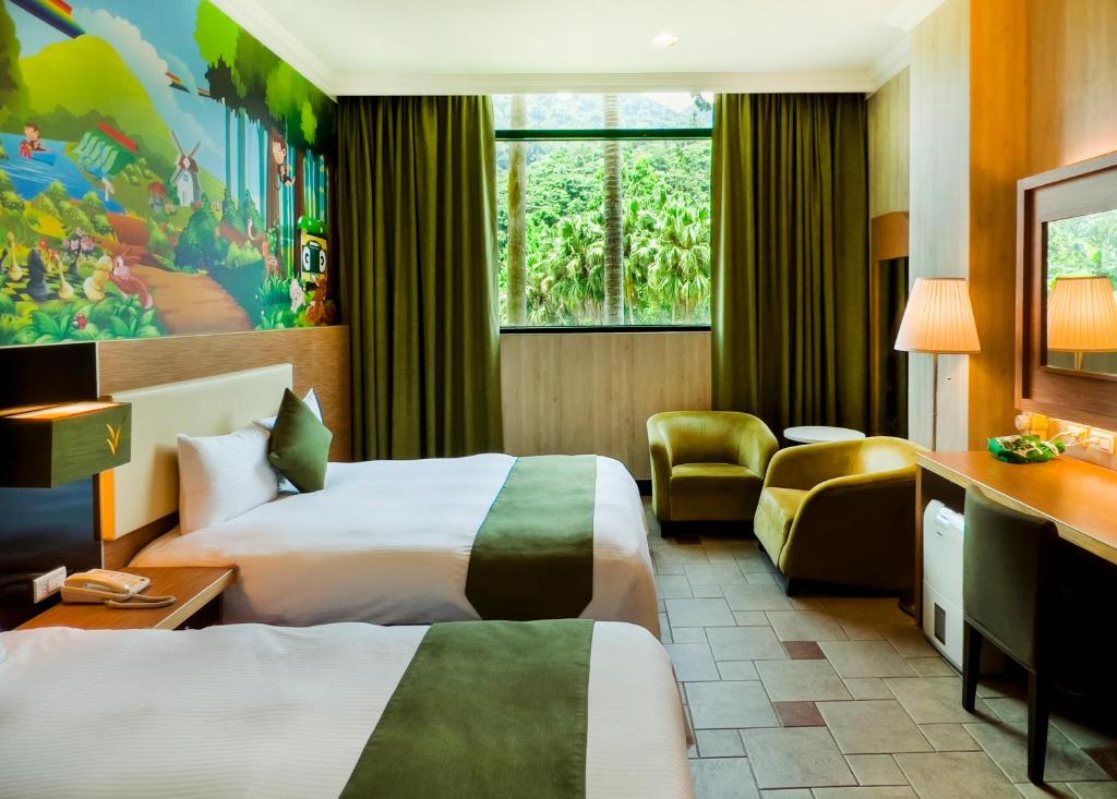 Postel nebo postele na pokoji v ubytování Uni-Resort Mawutu