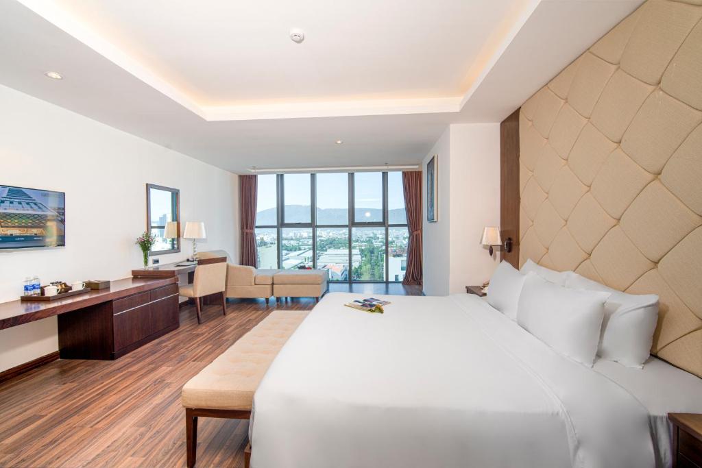 Postel nebo postele na pokoji v ubytování Luxtery Hotel & Spa