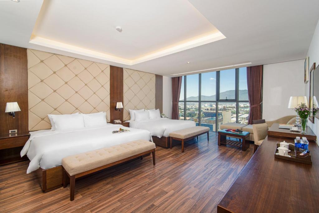 Postel nebo postele na pokoji v ubytování Luxtery Hotel & Spa