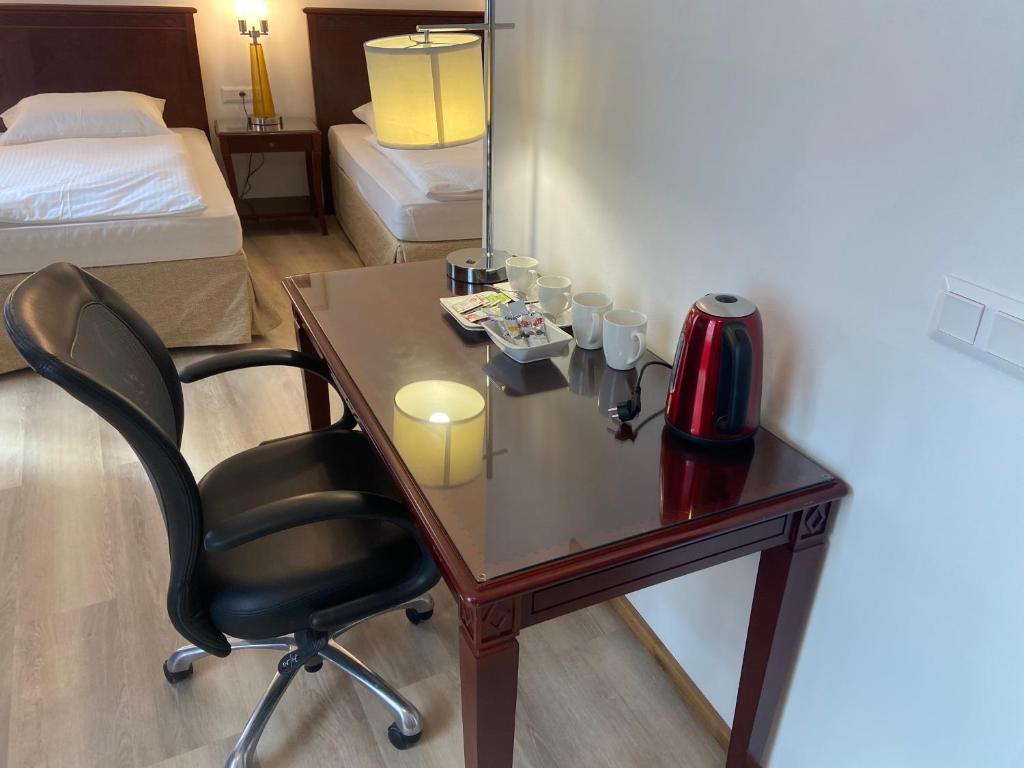 Postel nebo postele na pokoji v ubytování Aparthotel Slezák