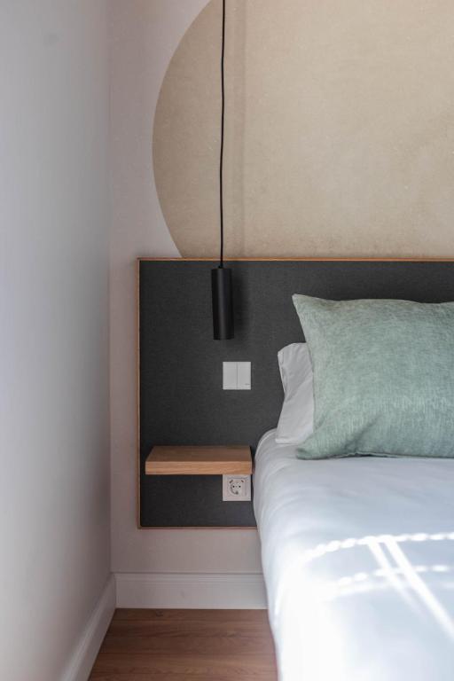 Lova arba lovos apgyvendinimo įstaigoje Green Studio apartment in Vanagupė