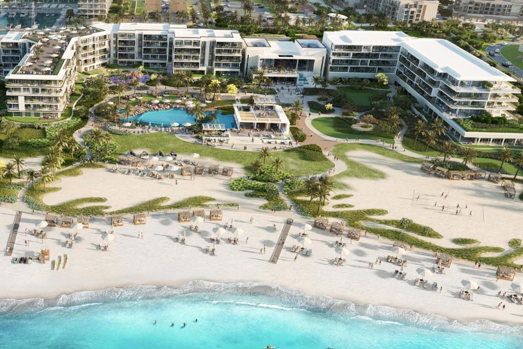 - une vue aérienne sur la plage du complexe dans l'établissement Address Beach Resort Marassi, à El Alamein