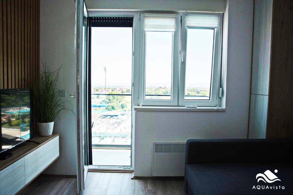 Posezení v ubytování AquaVista Apartman sopstveni parking uz doplatu