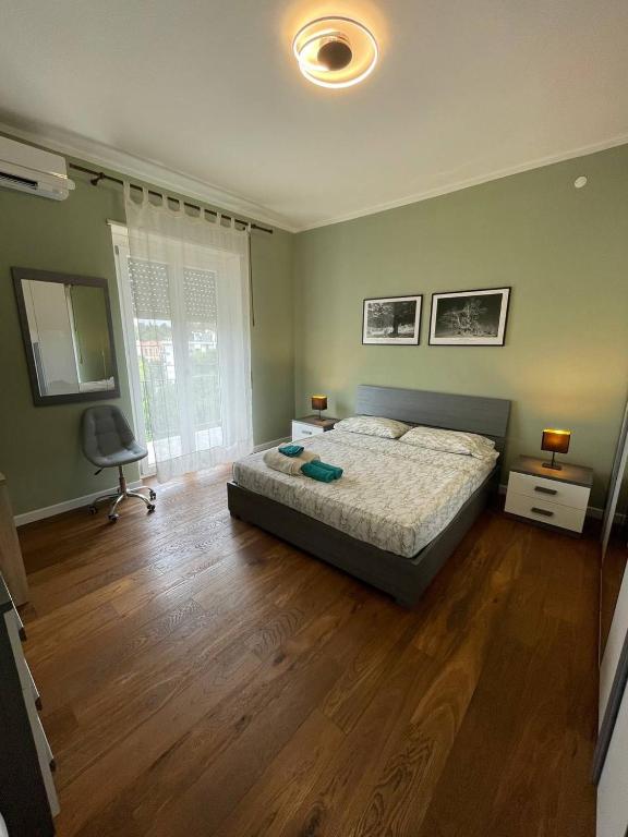 Postel nebo postele na pokoji v ubytování T-Rooms