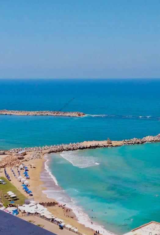 an aerial view of a beach with the ocean at سى فيو السريا in Alexandria