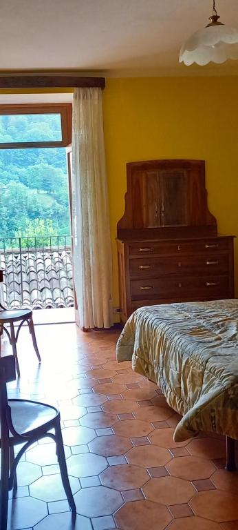 Postel nebo postele na pokoji v ubytování Casa zia Lidia