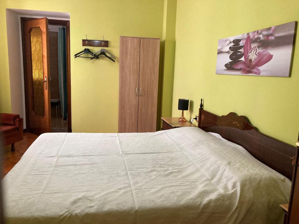 Postel nebo postele na pokoji v ubytování Casa zia Lidia