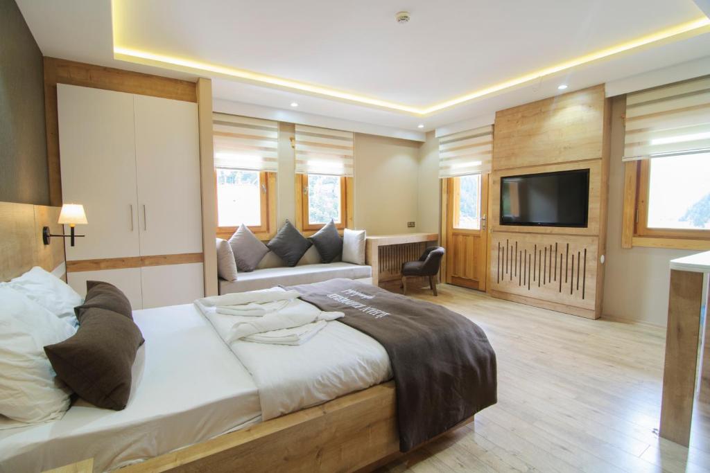 İlhan Kardeşler Apart Otel - Chambre Triple Avec Vue Sur Lac