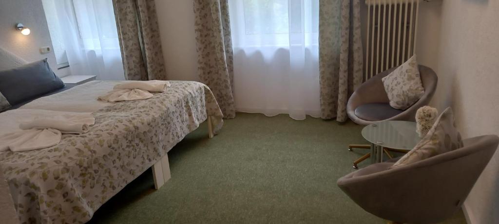 Postel nebo postele na pokoji v ubytování Waldpension Pfeiferhaus