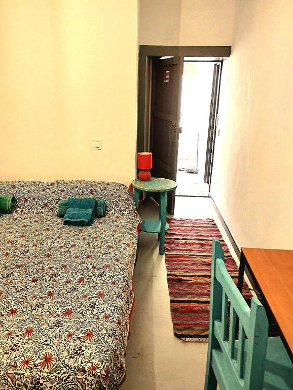 Postel nebo postele na pokoji v ubytování Acoran Family Guests House Firgas with Included Morning Yoga Practice