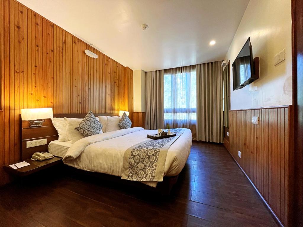 Postel nebo postele na pokoji v ubytování Cilantro Unwind Delisso Abode