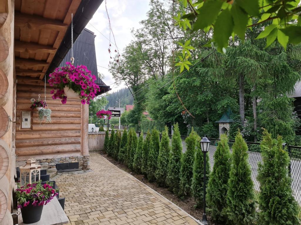 Vonkajšia záhrada v ubytovaní Apartamenty Góralski DACH NAD GŁOWĄ