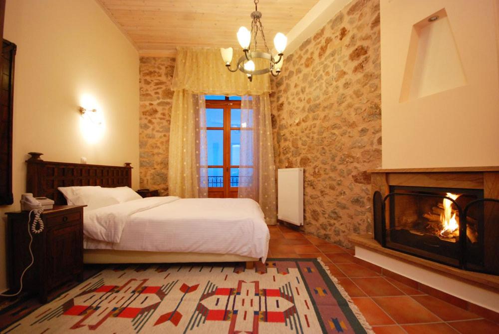 Posteľ alebo postele v izbe v ubytovaní Hotel Parnassos