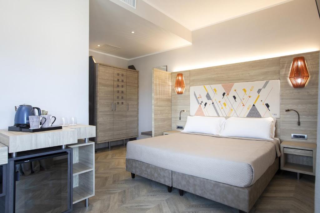 Postel nebo postele na pokoji v ubytování Lu' Hotel Carbonia