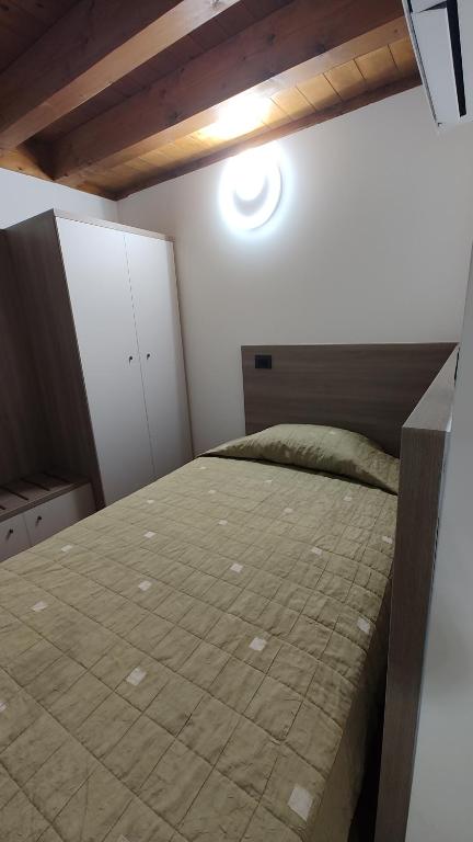 Postel nebo postele na pokoji v ubytování Wine Resort