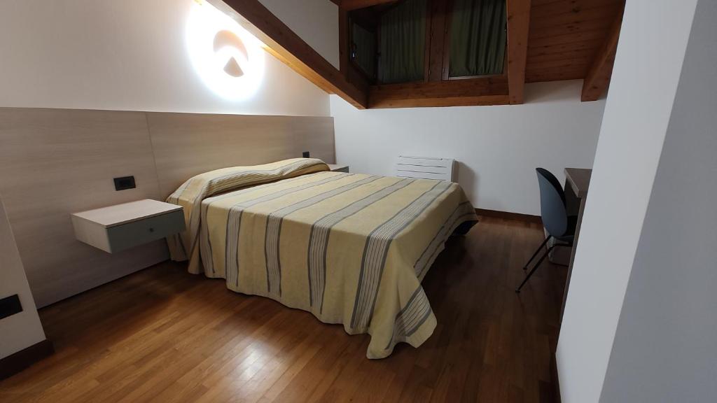 Postel nebo postele na pokoji v ubytování Wine Resort