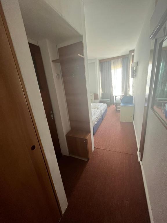 Postel nebo postele na pokoji v ubytování Hotel Banat