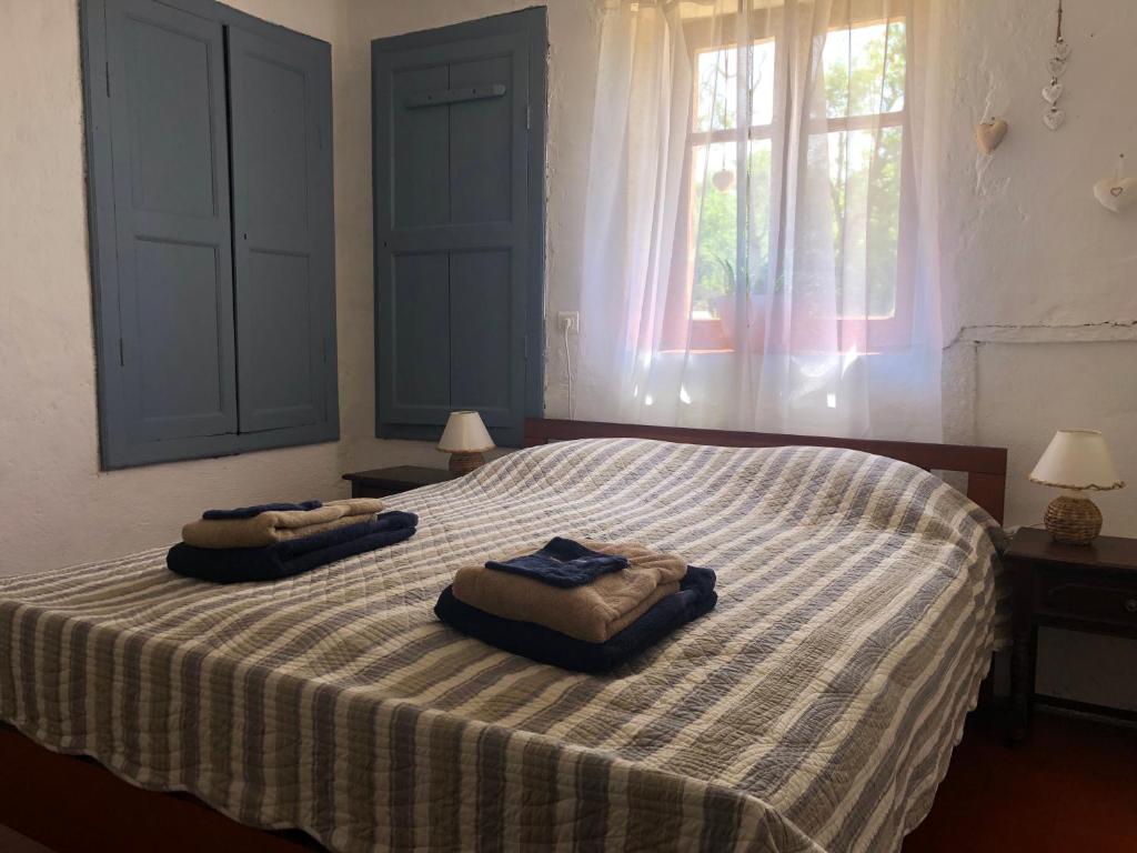 Postel nebo postele na pokoji v ubytování Maison Moulin Bousset
