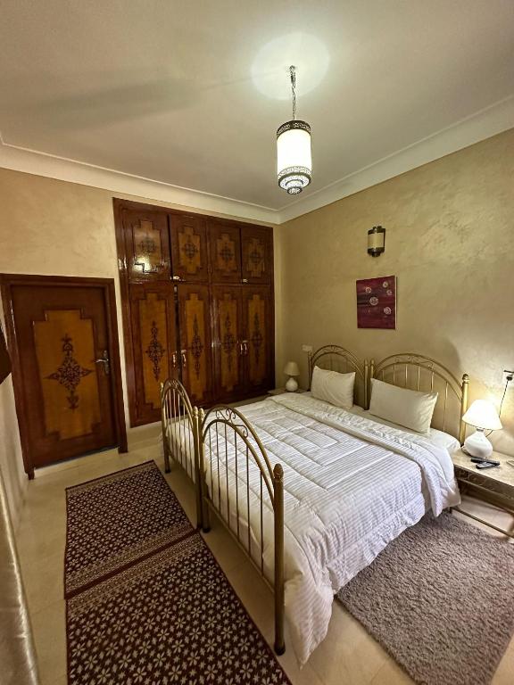 Postel nebo postele na pokoji v ubytování Riad Annada