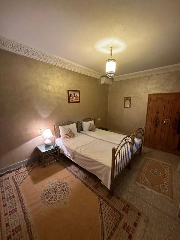 Postel nebo postele na pokoji v ubytování Riad Annada