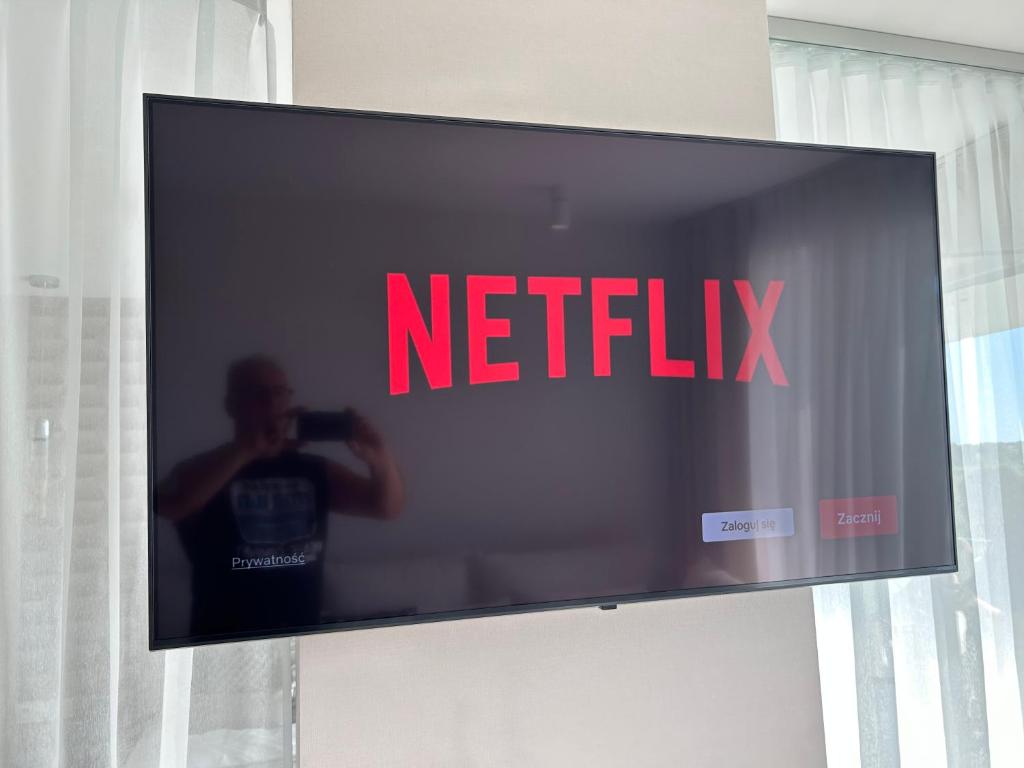 TV a/nebo společenská místnost v ubytování Westin House Apartamenty Baltic Premium