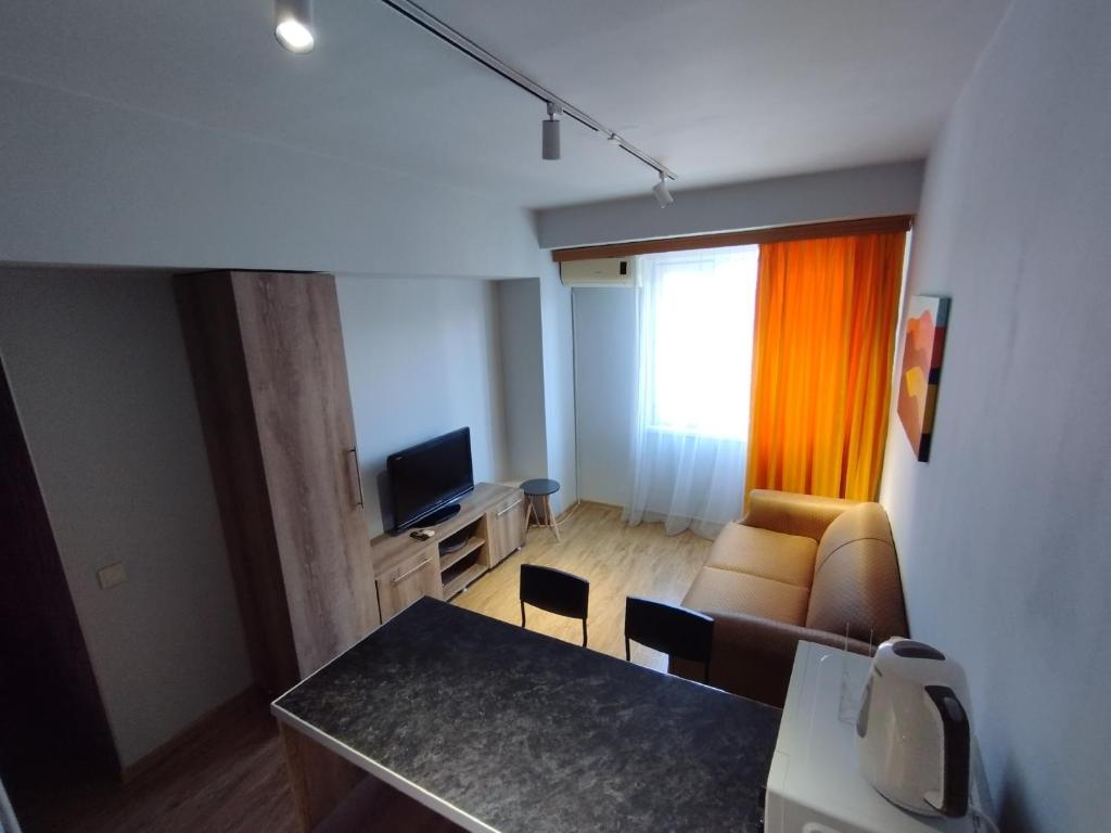 TV a/nebo společenská místnost v ubytování Davka Apartments