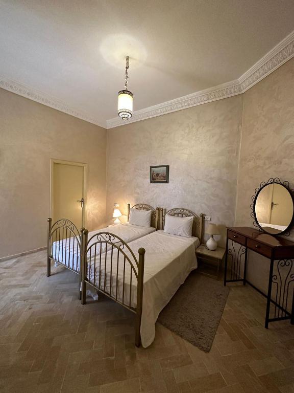 Postel nebo postele na pokoji v ubytování Riad Annada