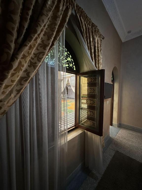 Postel nebo postele na pokoji v ubytování Riad Annada
