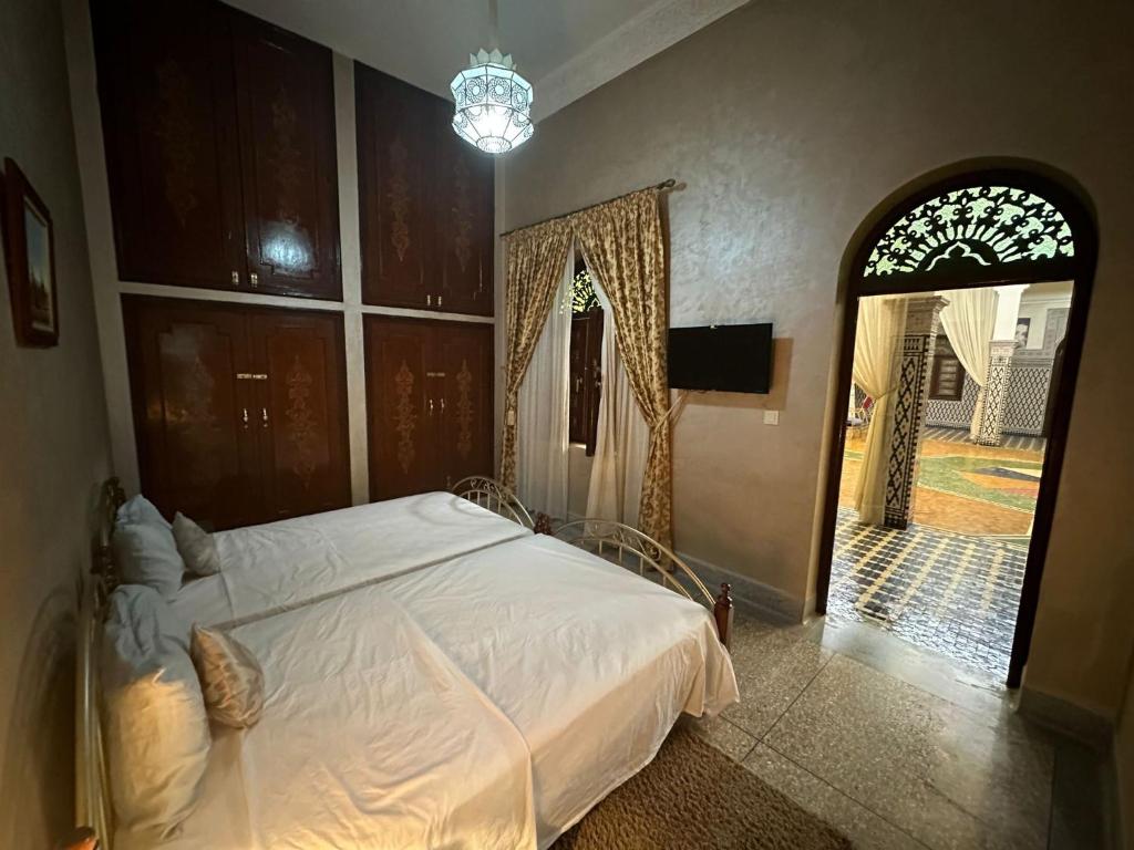 Postel nebo postele na pokoji v ubytování Riad Annada