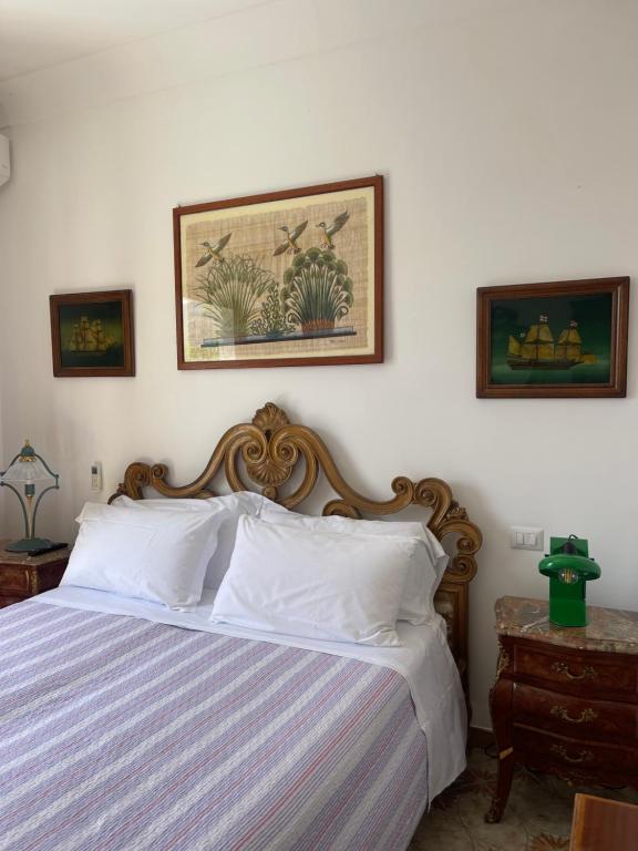 Кровать или кровати в номере La Dolce Vita a Positano boutique hotel