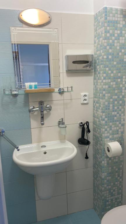 Koupelna v ubytování Aparthotel Slezák