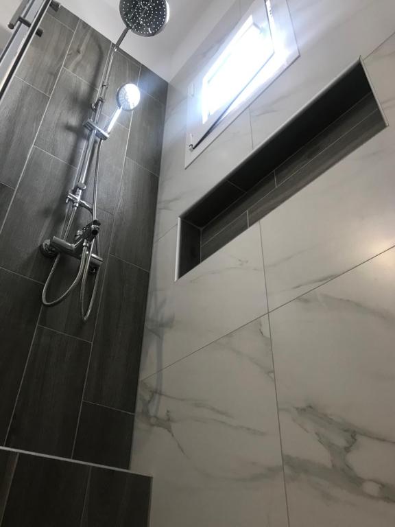 Koupelna v ubytování Bafas Apartments