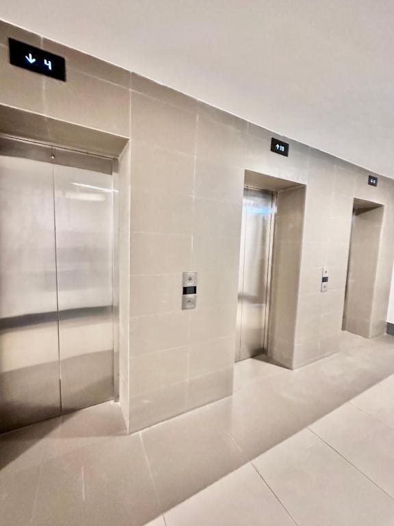 Aesthetic One Bedroom Beside SM w Pool, Wifi and Netflix photo