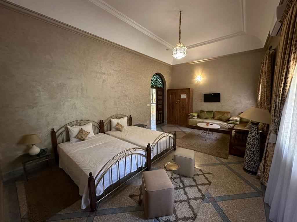 Postel nebo postele na pokoji v ubytování Riad Annada
