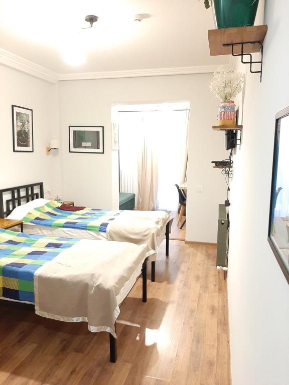 Postel nebo postele na pokoji v ubytování Hotel Art Nikola Rooms