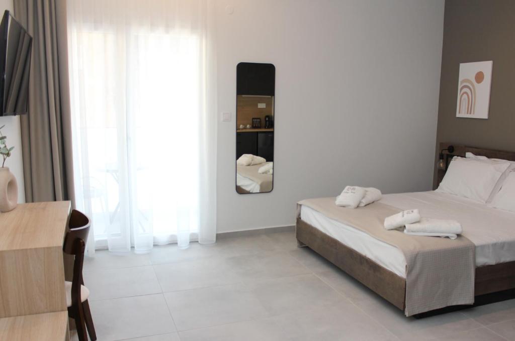 Postel nebo postele na pokoji v ubytování UrbanBay Hotel & Spa
