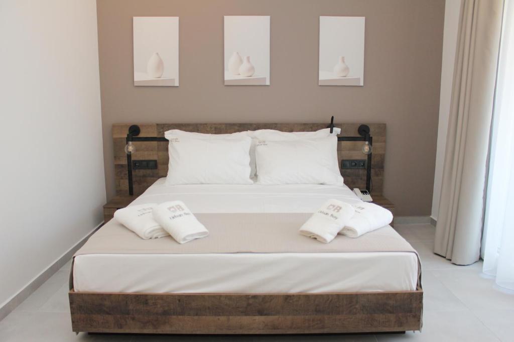 Postel nebo postele na pokoji v ubytování UrbanBay Hotel & Spa