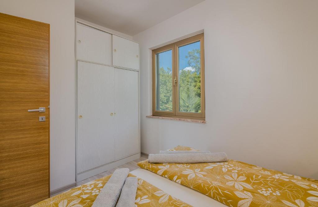 Posteľ alebo postele v izbe v ubytovaní Apartment Moderna Soline