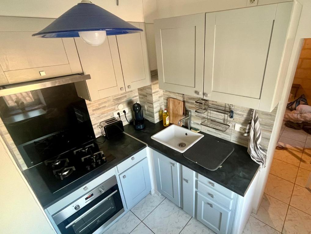 Kuchyň nebo kuchyňský kout v ubytování Appartement Belle-vue