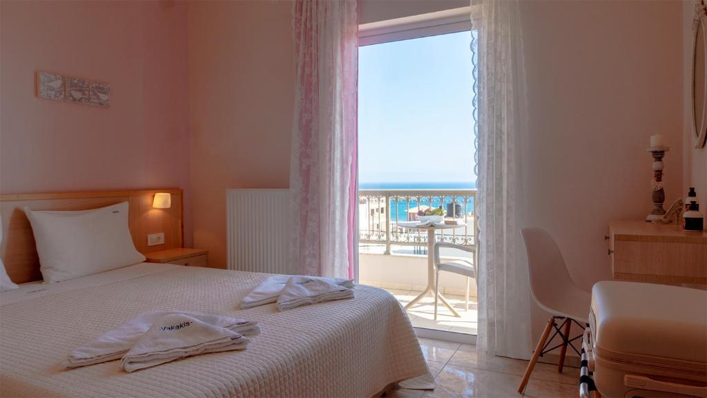 Postel nebo postele na pokoji v ubytování Vakakis-ME Apartments