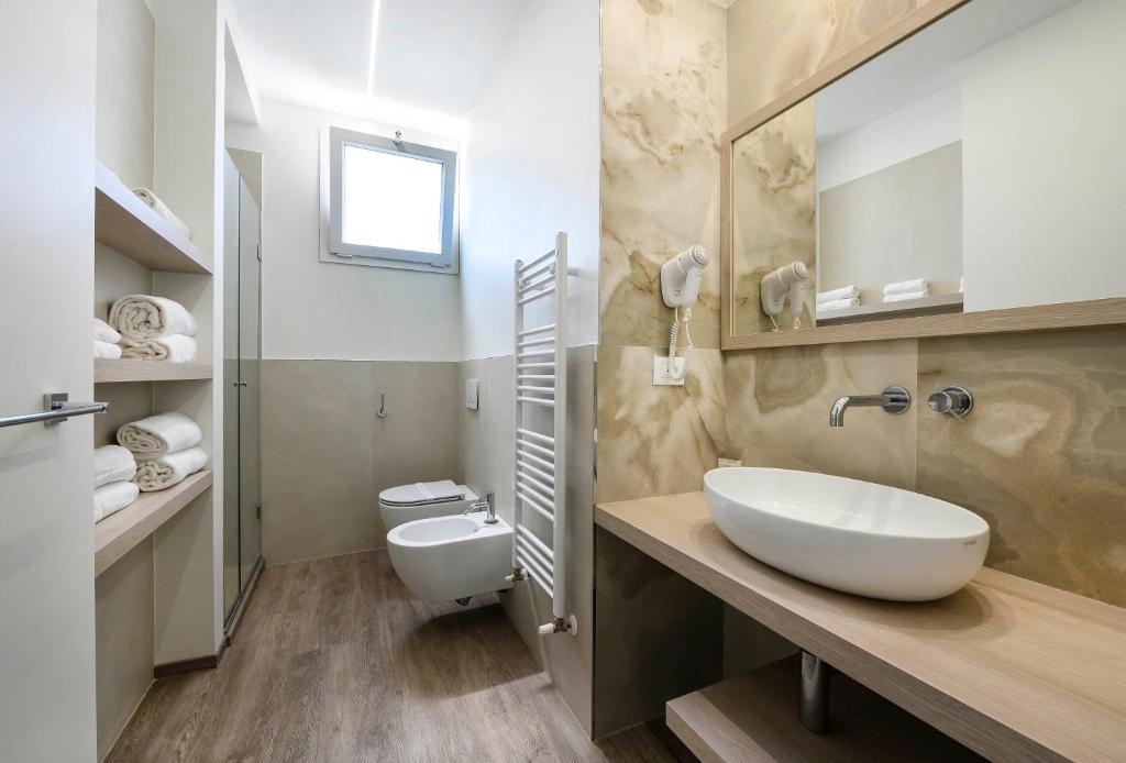 Koupelna v ubytování Hotel Harmony