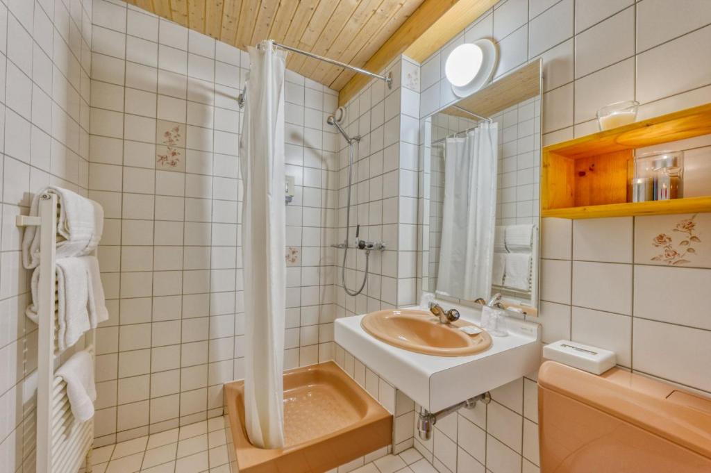 Koupelna v ubytování Hôtel Les Sources