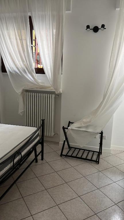 Postel nebo postele na pokoji v ubytování JACAM home free parking Como