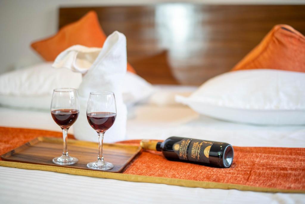 Postel nebo postele na pokoji v ubytování Hotel Pala
